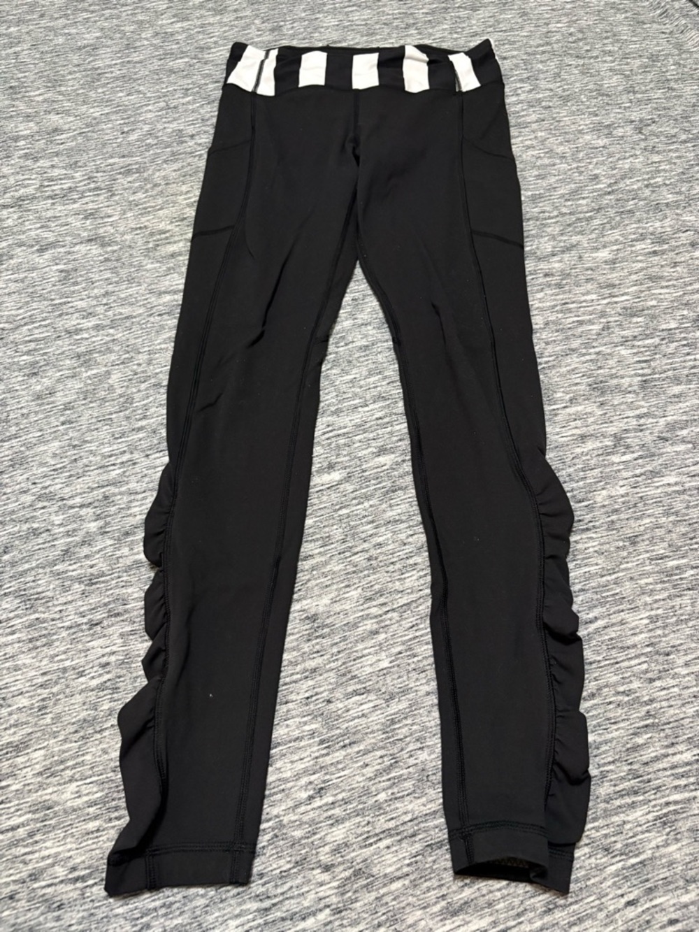 Lululemon Speed Tight Black with Ruffle Size 6